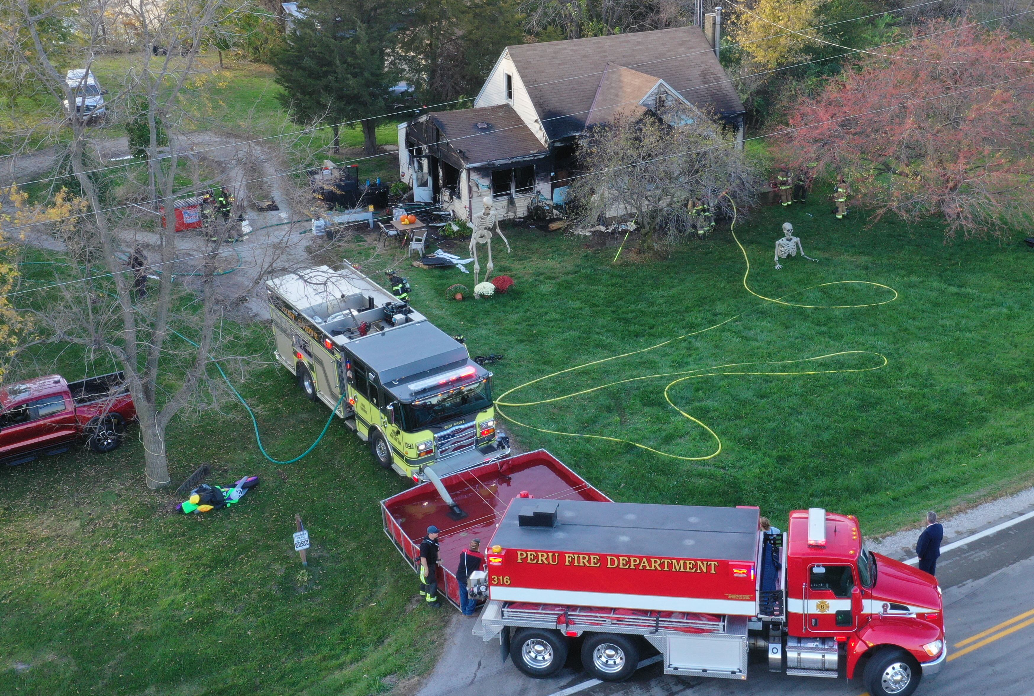 Photos: Firefighters respond to house fire south of Troy Grove — Shaw Local News Network